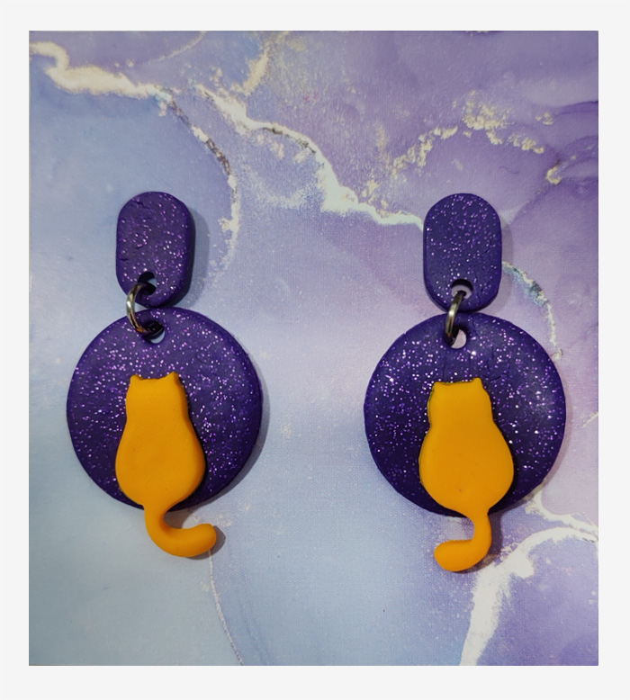 Purple round with yellow cats